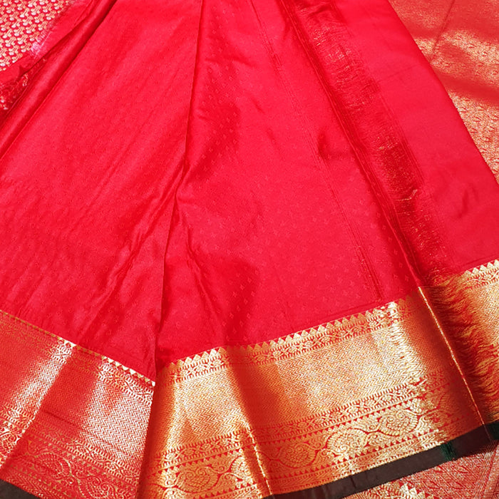 red and gold silk saree